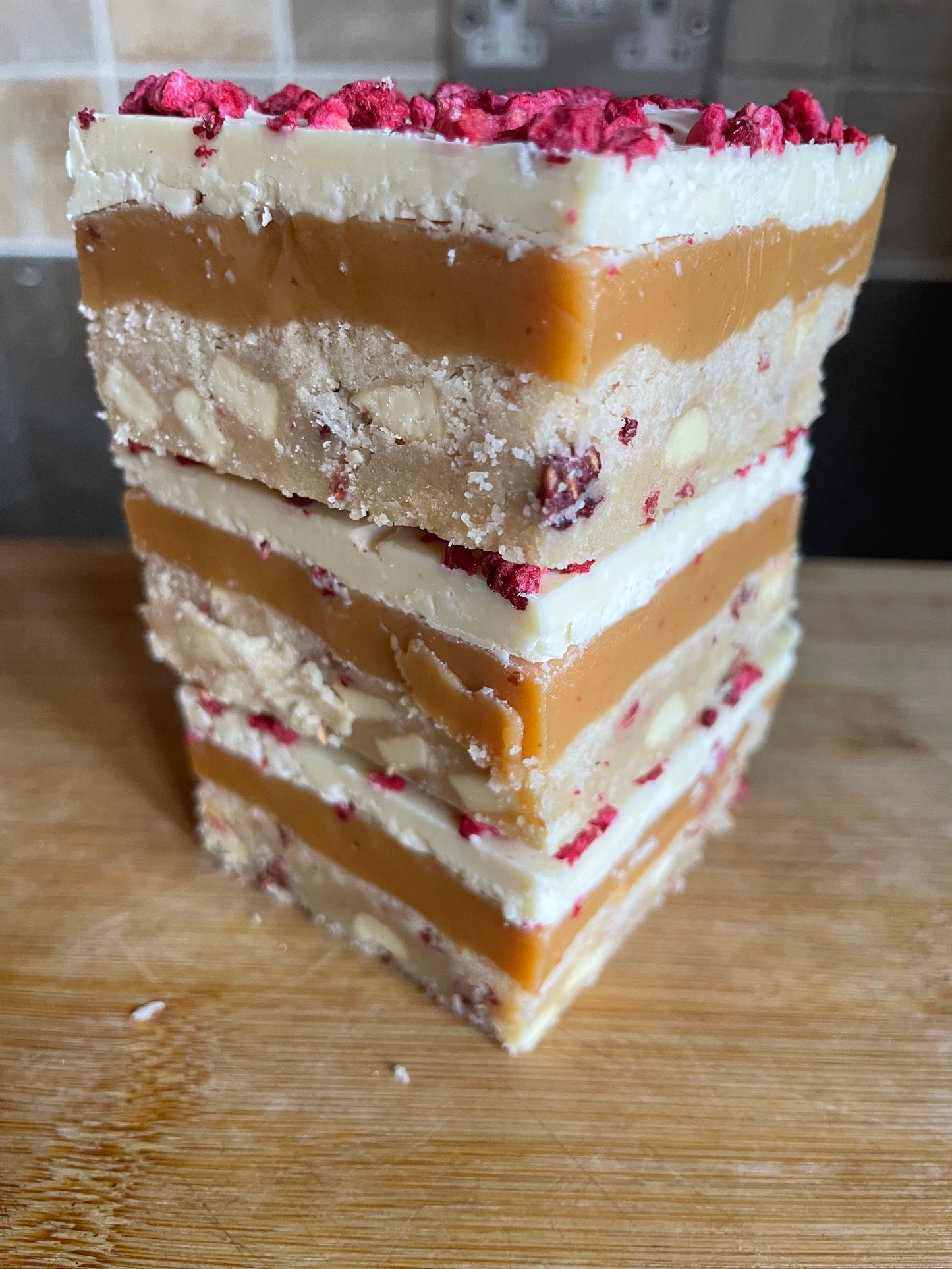 Raspberry & white chocolate millionaire shortbread